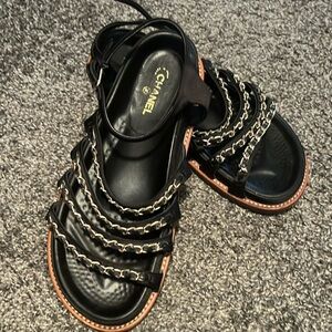Chanel Satin Lambskin flat chain sandal.